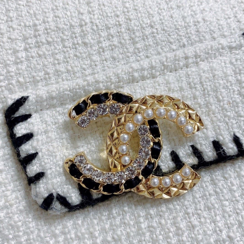 Ch*el brooches